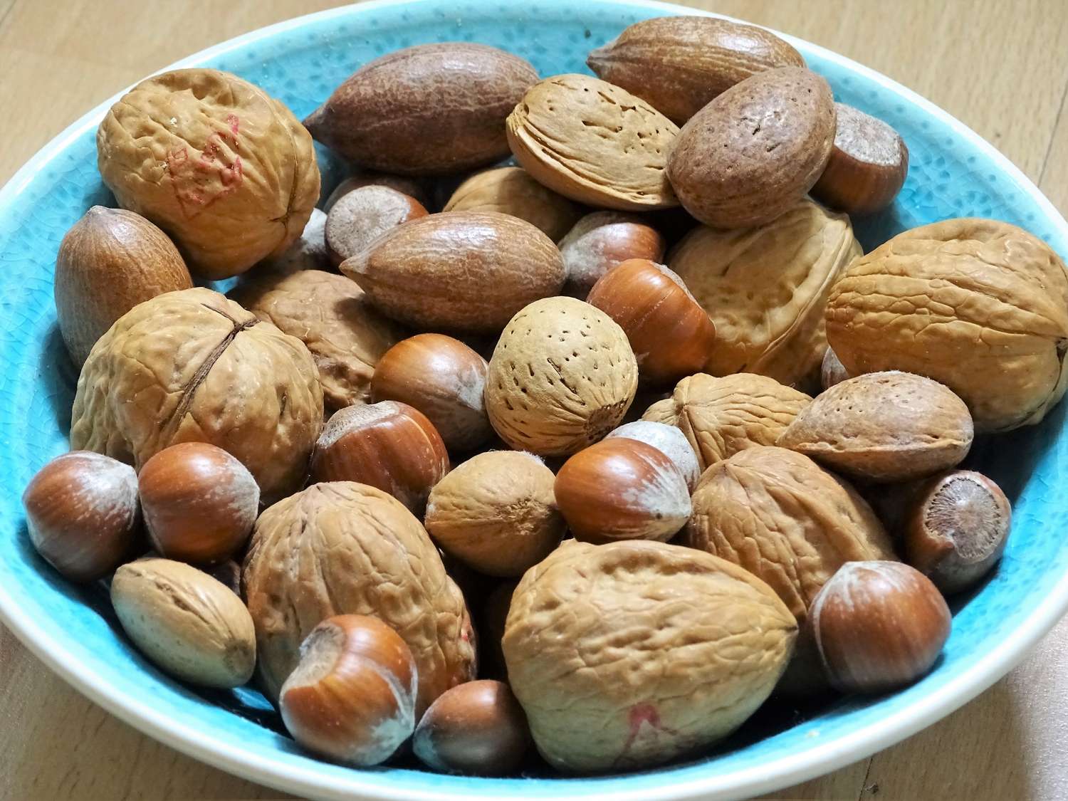 A bowl containing mixed nuts